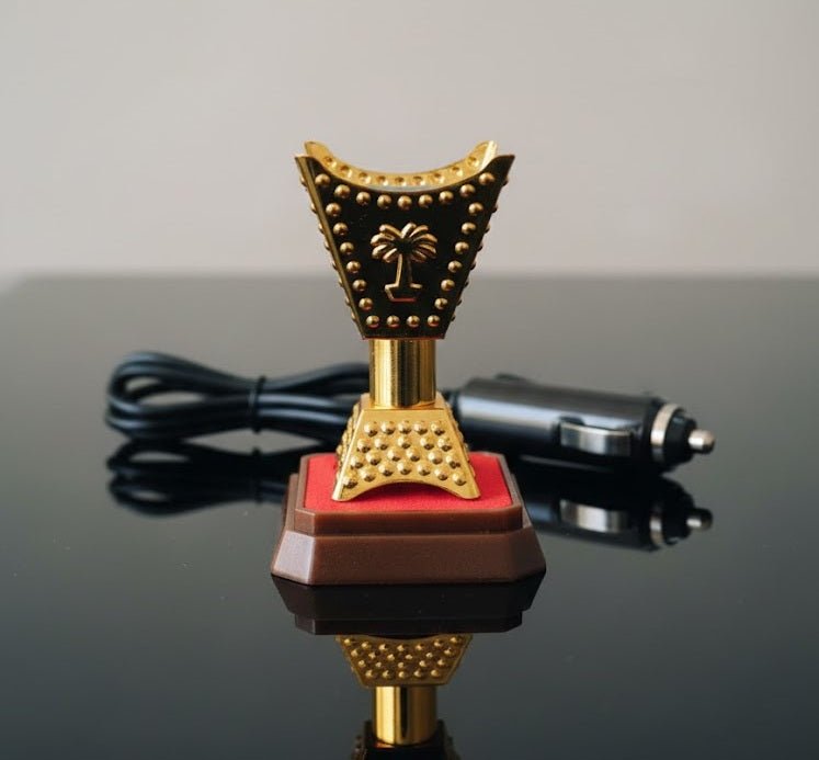Car bakhoor incense burner plugged into 12V socket