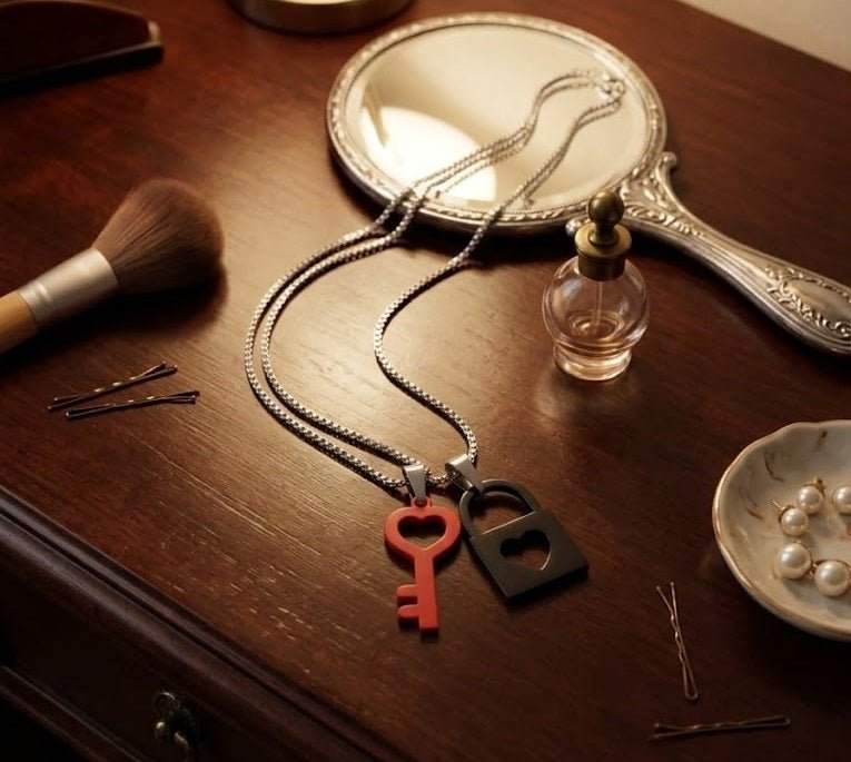 Key and Lock pendants worn together